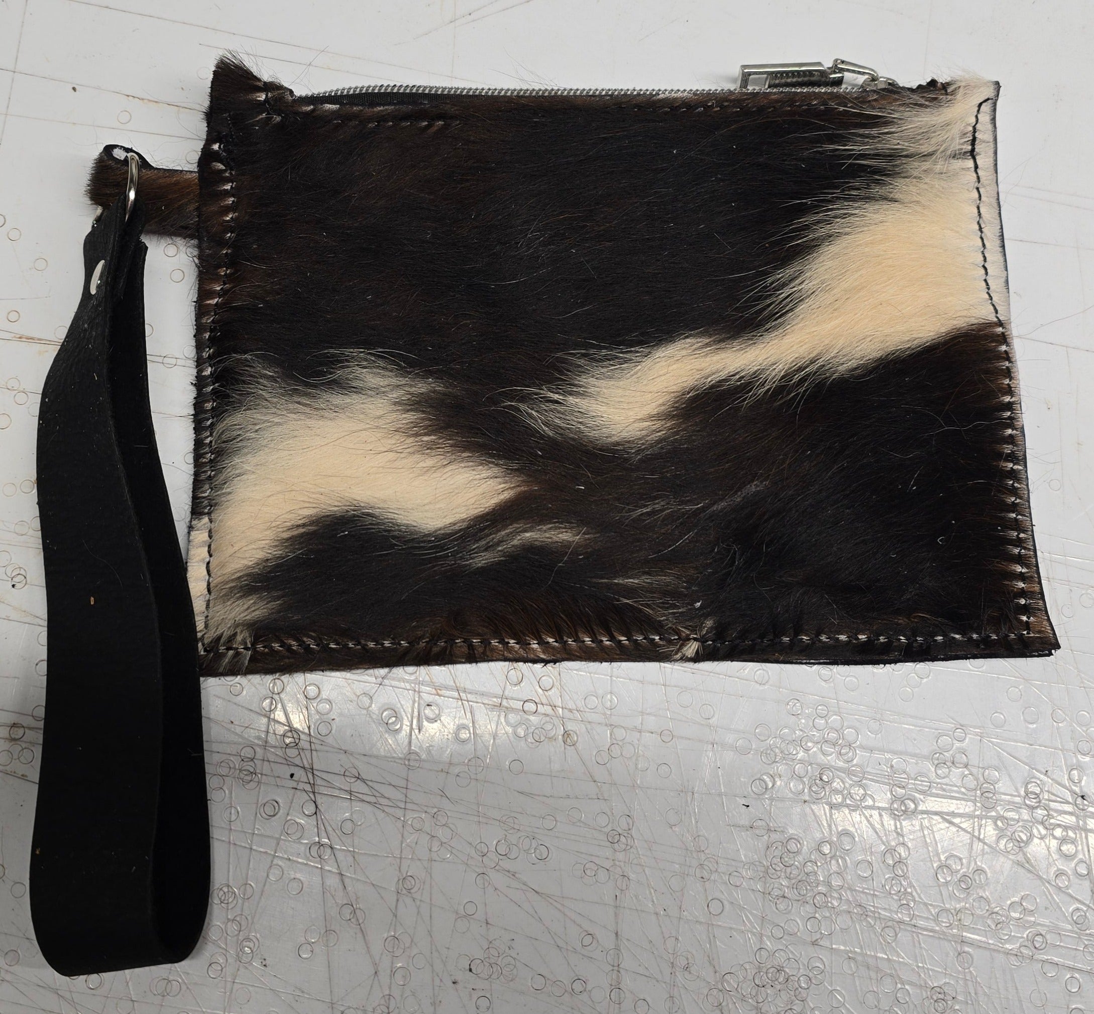 bbk leather designs handmade black and white cow furr wristlet